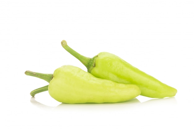 Green chili peppers isolated on white background