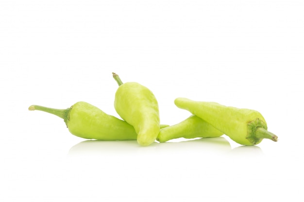 Green chili peppers isolated on white background