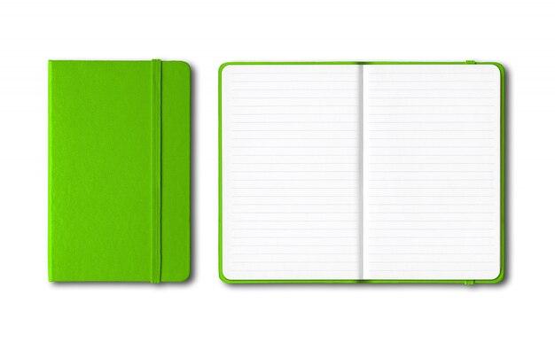 Green closed and open lined notebooks isolated on white