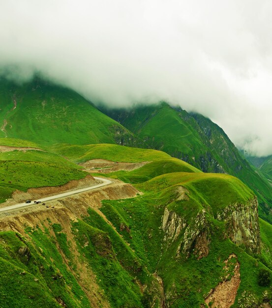 Green cloudy caucasus mountains landscape in Georgia natural background