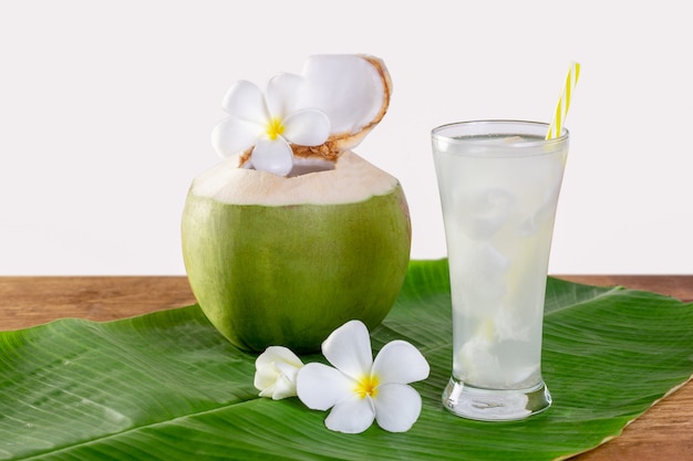 Green coconut fruit cut open to drink juice and eat.