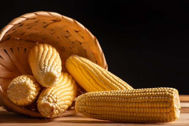 Green corn beautiful green corn cobs on rustic wood selective focus