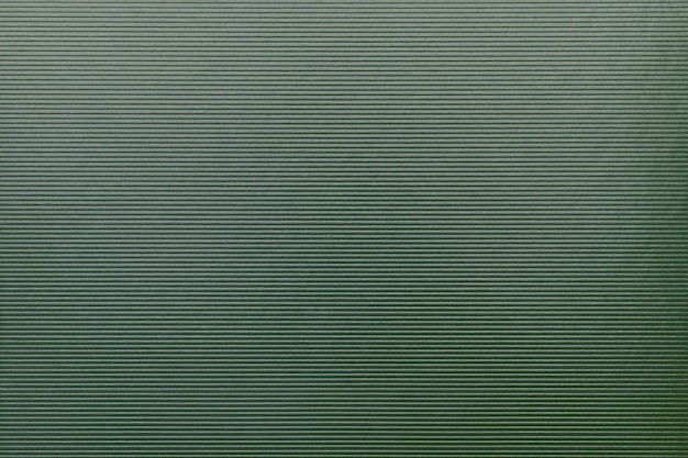 Green corrugated cardboard textured background