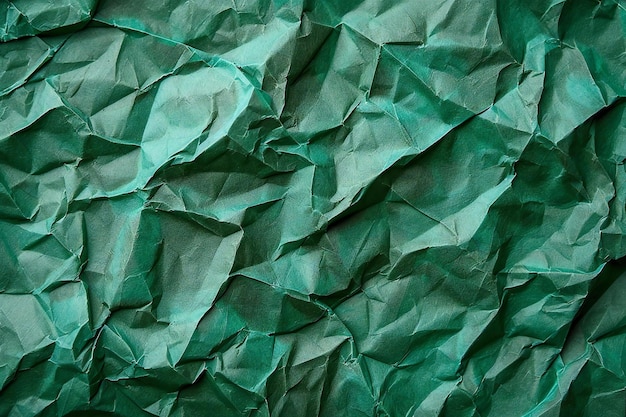 Green crumpled paper background Crumpled paper texture