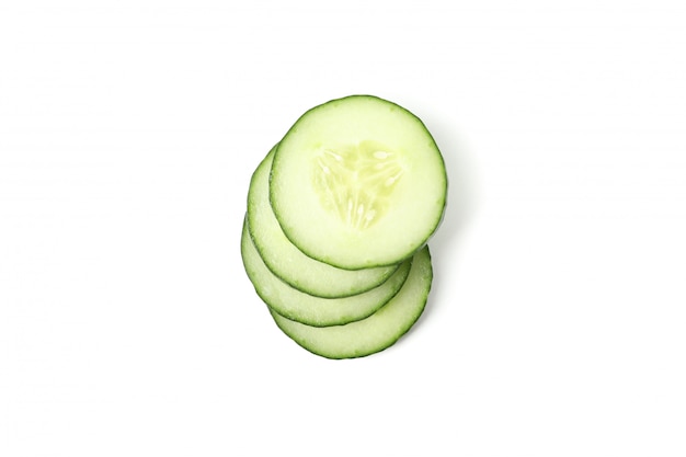 Green cucumber slices isolated on white background