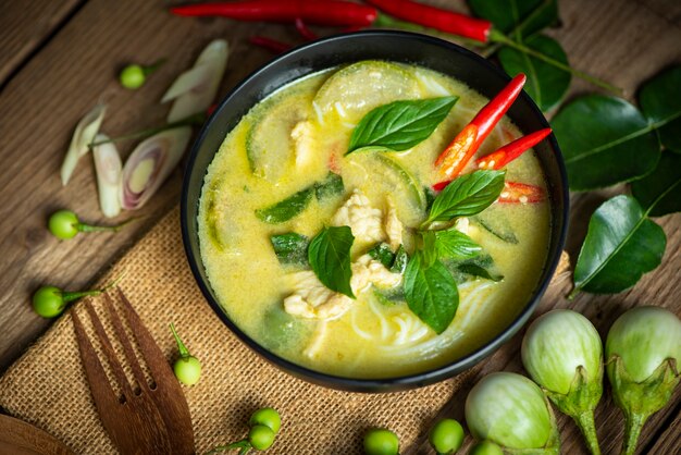 Green curry chicken cuisine asian food, Thai food on soup bowl with herbs and spices