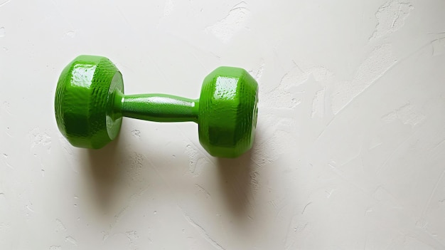 Photo a green dumbbell with the word  on it