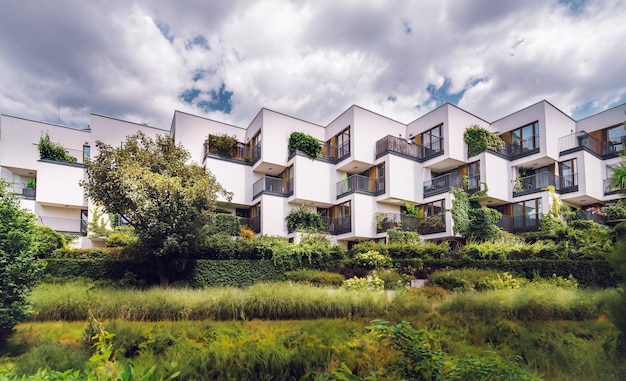 Green eco housing estate Cubist minimalist modern architecture Real estate urban plants