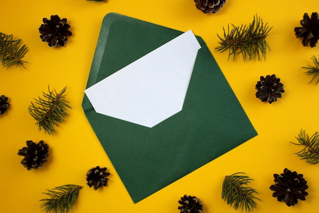 Green envelope with a white sheet on a background