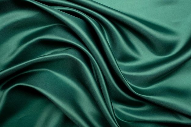 Green fabric texture background abstract closeup texture of cloth