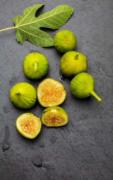 Green figs, fresh and ripe. With a fig leaf