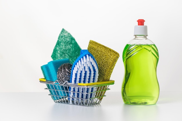 Green gel and a set of rags and brushes on a white table