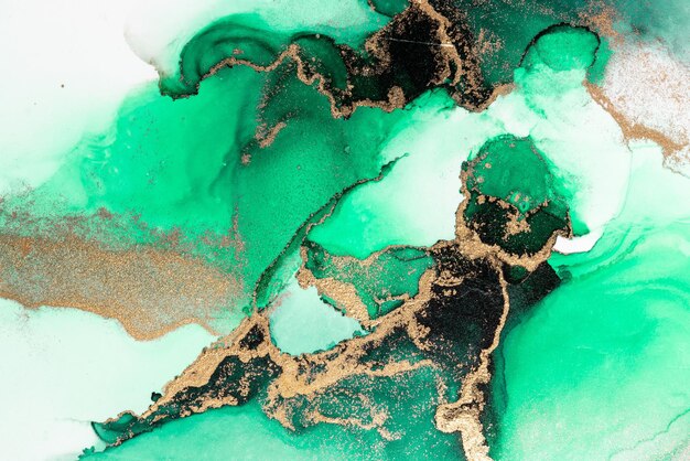 Green gold abstract background of marble liquid ink art painting on paper .