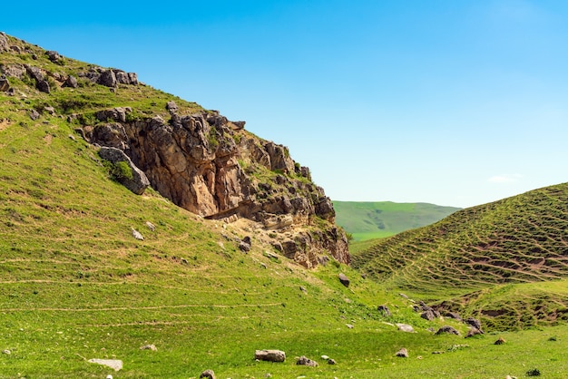 Green hills and cliffs in spring