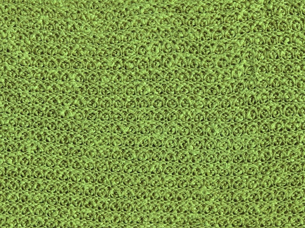 Green knitting wool texture full frame Knitted green texture surface close up Textile green material with wicker pattern