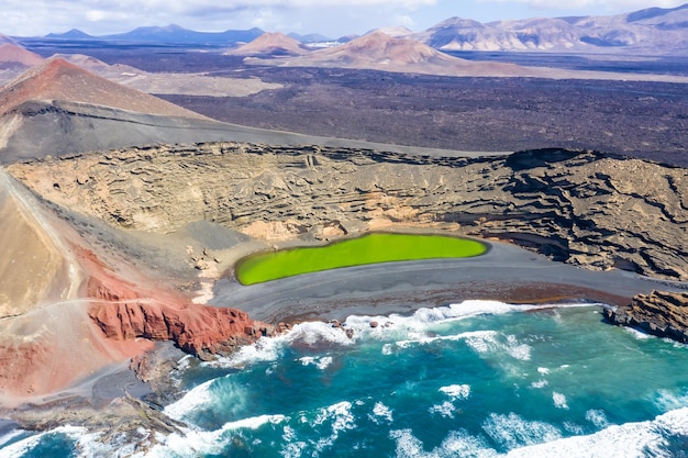 Green lake aerial view Charco de Los Clicos Verde near El Golfo on Lanzarote island on Canary Islands in Spain