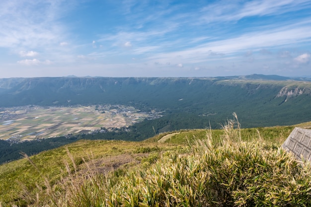 Green landscape with mountain Aso background, view at the top of mountain from Daikanbo