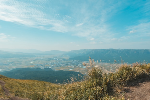 Green landscape with mountain Aso background, view at the top of mountain from Daikanbo