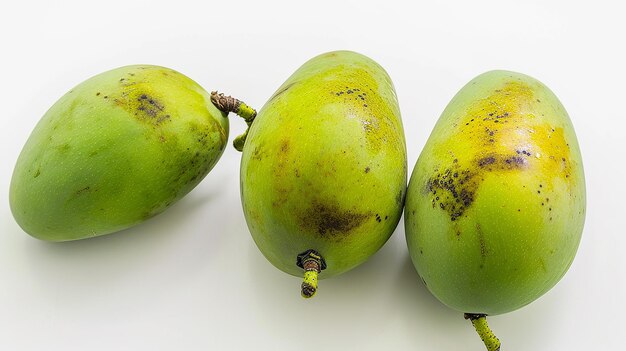 Green mango tropical fruit on white background