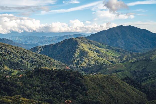 Green mountain valley nan thailandgreen mountain fields with blue sky