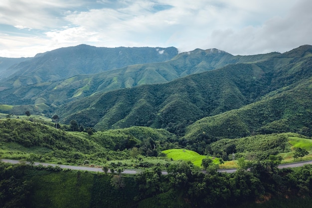 Green mountain valley nan thailandgreen mountain fields with blue sky