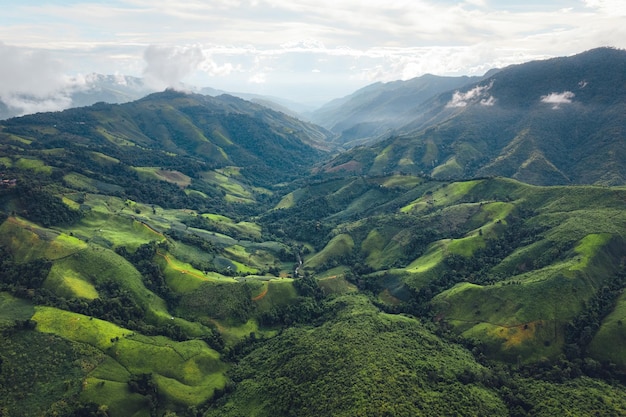 Green mountain valley nan thailandgreen mountain fields with blue sky