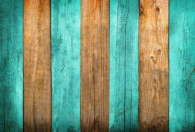 Green and natural wood textured planks background with delicate vignetting