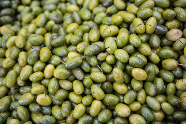 Green Olives as health food homemade marinade with herbs