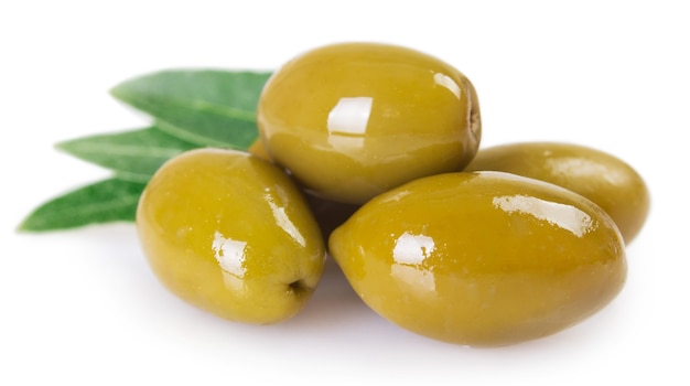 Green olives isolated on white background closeup