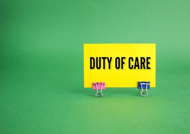 green paper flanked with the words duty of care