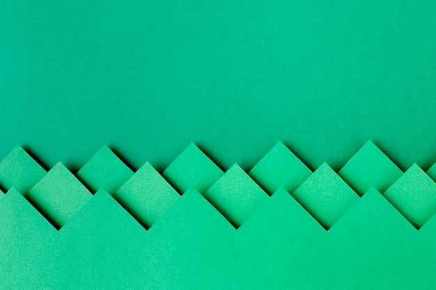 Green paper shapes background design