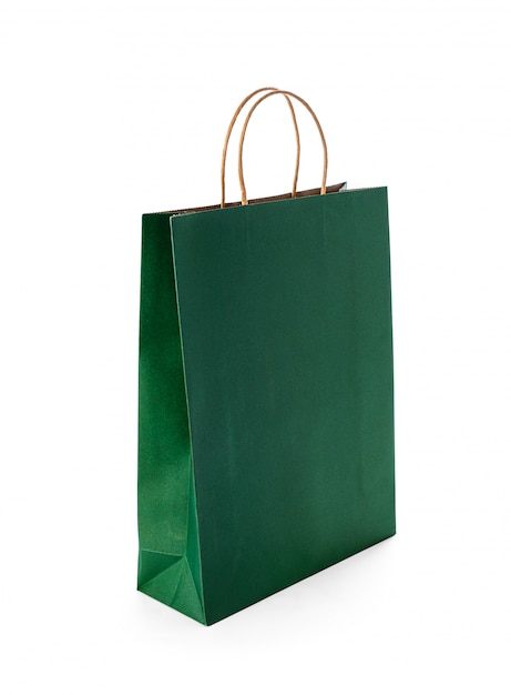 Green paper shopping bags isolated on white surface