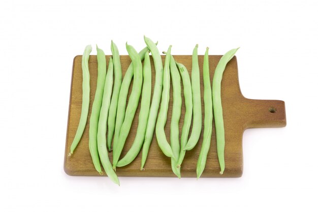 Green peas isolated on white background.