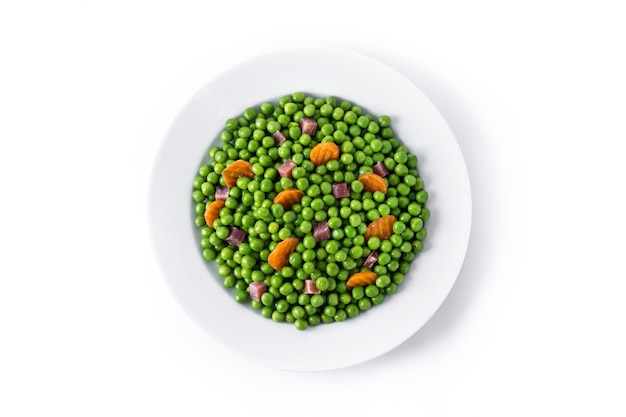 Green peas with serrano ham and carrot isolated on white background