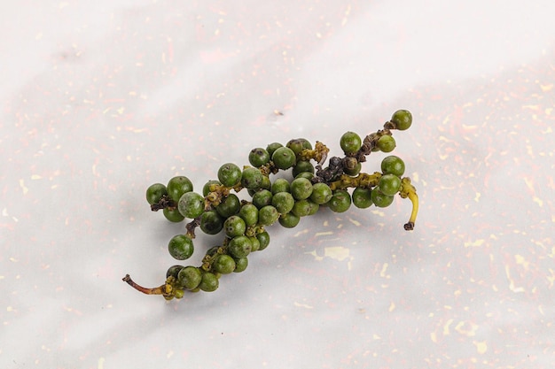 Green pepper corn heap isolated