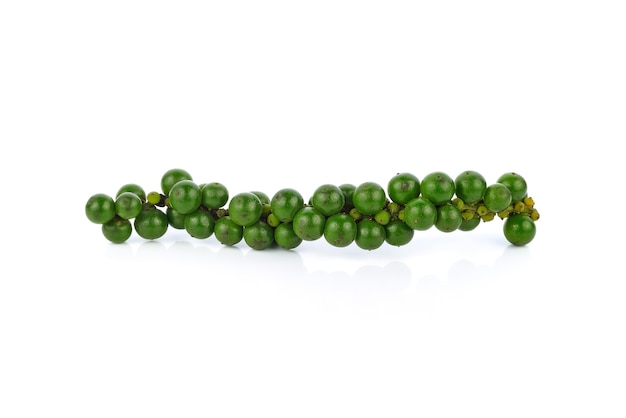 Green peppercorns isolated on white