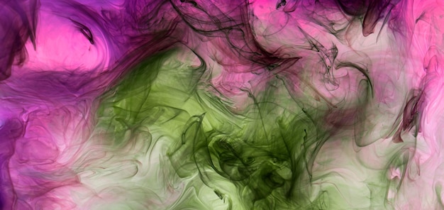 Green purple smoke abstract background acrylic paint underwater explosion