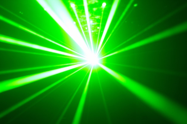 Green and red laser in a nightclub. Laser beams, club atmosphere