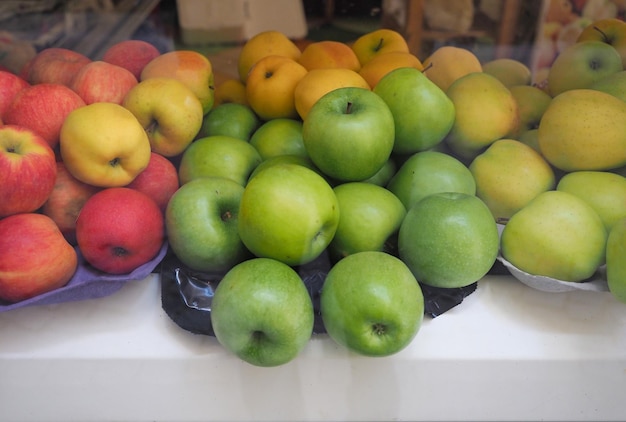 Green red and yellow apples fruits