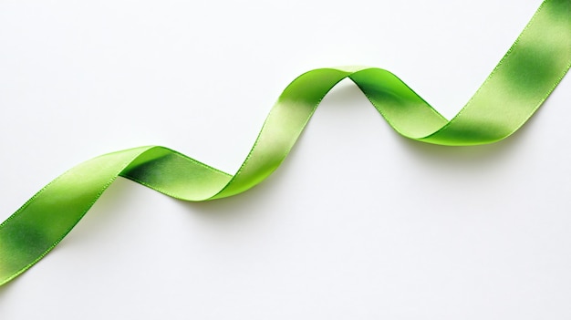 Green Ribbon on White Background Top View