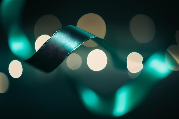 Photo green ribbon with light flare supportive focus