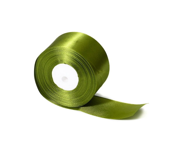 Green roll of silk green ribbon, wrapping decor, white isolated background