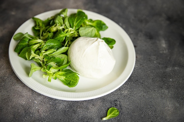 green salad buratta leaves mix fresh healthy meal food snack on the table copy space food