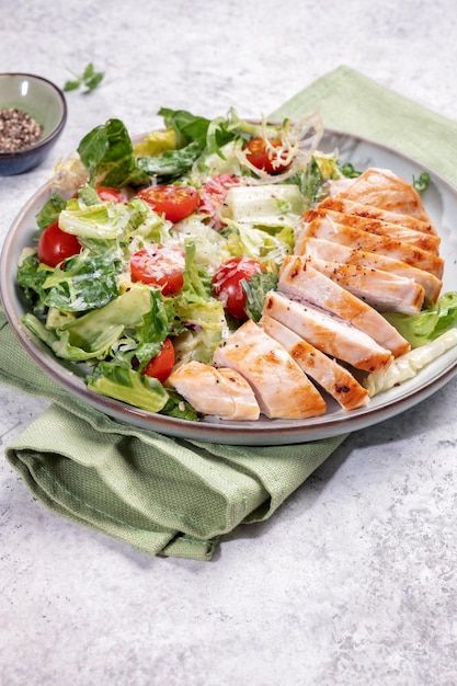 Green salad with grilled chicken breast