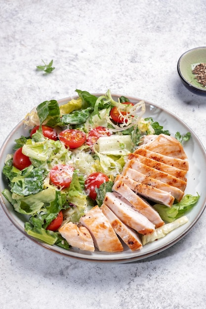 Green salad with grilled chicken breast