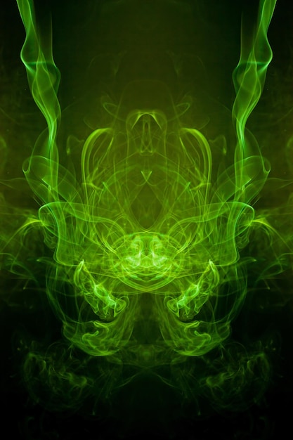 Green smoke motion on black background