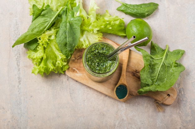 Green smoothie with spirulina. Young barley and chlorella spirulina. Detox superfood.