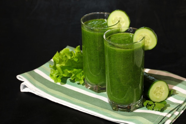 Green smoothies made from raw vegetables and leaves healthy drink