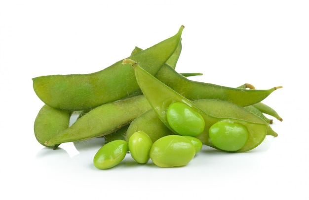 Green soybeans on white wall