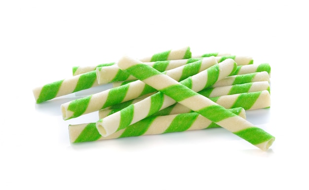 Green stripe wafer rolls on white background